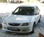 Mazda 323 2.0MT 2003 - Bán Mazda 323 2.0MT năm sản xuất 2003, màu trắng, nhập khẩu nguyên chiếc, giá 119tr