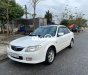 Mazda 323 2.0MT 2003 - Bán Mazda 323 2.0MT năm sản xuất 2003, màu trắng, nhập khẩu nguyên chiếc, giá 119tr