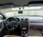 Mazda 323 2000 - Bán Mazda 323 năm 2000, màu đen số sàn