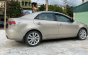 Kia Forte 2010 - Cần bán xe Kia Forte SX 1.6 AT năm sản xuất 2010, màu vàng