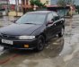 Mazda 323 2000 - Bán Mazda 323 năm 2000, màu đen số sàn