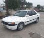 Mazda 323 1995 - Cần bán xe Mazda 323 2.0MT sản xuất năm 1995, màu trắng, nhập khẩu