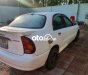 Daewoo Lanos MT 2001 - Cần bán xe Daewoo Lanos MT năm 2001, màu trắng, xe nhập