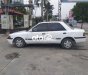 Mazda 323 1995 - Cần bán xe Mazda 323 2.0MT sản xuất năm 1995, màu trắng, nhập khẩu