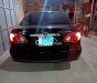 Toyota Corolla 1.8E MT 2004 - Cần bán Toyota Corolla 1.8E MT năm 2004, màu đen