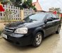 Daewoo Lacetti EX 2010 - Cần bán xe Daewoo Lacetti EX năm 2010, màu đen