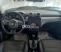 Suzuki Swift 2021 - Cần bán Suzuki Swift 1.4AT sản xuất 2021, màu trắng, xe nhập