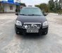 Daewoo Gentra SX 2009 - Cần bán xe Daewoo Gentra SX sản xuất năm 2009, màu đen, 135tr