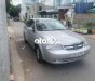 Chevrolet Lacetti  EX 1.6MT 2009 - Bán lại xe Chevrolet Lacetti EX 1.6MT sản xuất 2009, màu bạc xe gia đình