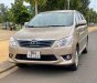Toyota Innova E  2013 - Bán ô tô Toyota Innova E sản xuất 2013, màu vàng số sàn