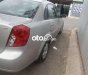 Chevrolet Lacetti  EX 1.6MT 2009 - Bán lại xe Chevrolet Lacetti EX 1.6MT sản xuất 2009, màu bạc xe gia đình