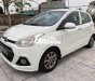 Hyundai Grand i10 2014 - Bán Hyundai Grand i10 sản xuất 2014, màu trắng, nhập khẩu