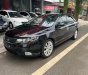 Kia Forte   1.6 MT  2012 - Cần bán lại xe Kia Forte 1.6 MT năm sản xuất 2012, màu đen số sàn, giá tốt