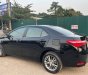 Toyota Corolla 2015 - Cần bán gấp Toyota Corolla 1.8G năm sản xuất 2015, màu đen, giá chỉ 543 triệu