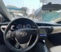 Toyota Corolla 2015 - Cần bán gấp Toyota Corolla 1.8G năm sản xuất 2015, màu đen, giá chỉ 543 triệu