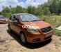 Daewoo Gentra 2009 - Cần bán lại xe Daewoo Gentra SX năm sản xuất 2009, màu cam đẹp