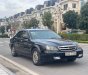 Daewoo Magnus 2004 - Bán xe Daewoo Magnus 2.0 năm sản xuất 2004, màu đen