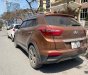 Hyundai Creta 2017 - Cần bán lại xe Hyundai Creta năm sản xuất 2017, màu nâu còn mới, giá tốt