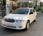 Toyota Corolla 2004 - Cần bán Toyota Corolla sản xuất năm 2004, màu trắng, nhập khẩu nguyên chiếc