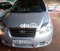 Daewoo Gentra 2009 - Cần bán Daewoo Gentra SX sản xuất 2009, màu bạc, xe nhập, 139tr