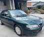 Mazda 626 2003 - Cần bán Mazda 626 MT sản xuất 2003, màu xanh lục giá cạnh tranh