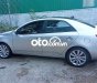 Kia Forte 2012 - Cần bán gấp Kia Forte sản xuất 2012, màu bạc