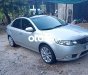 Kia Forte 2012 - Cần bán gấp Kia Forte sản xuất 2012, màu bạc