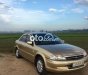 Ford Laser 2000 - Bán Ford Laser sản xuất năm 2000, màu vàng