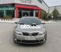 Kia Cerato 2010 - Bán Kia Cerato 1.6AT Deluxe sản xuất 2010, màu xám