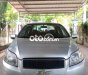 Chevrolet Aveo 2014 - Cần bán Chevrolet Aveo LT sản xuất 2014, màu bạc