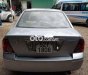 Ford Laser 2004 - Bán ô tô Ford Laser LXI năm 2004, màu bạc số sàn