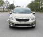 Kia K3 2014 - Cần bán gấp Kia K3 1.6AT sản xuất năm 2014, màu vàng cát, giá cạnh tranh