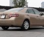 Toyota Camry 2009 - Bán xe Toyota Camry LE 2.5 năm sản xuất 2009, màu vàng, xe nhập