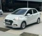 Hyundai Grand i10 2020 - Bán Hyundai Grand i10 1.2AT sản xuất 2020, màu trắng số tự động, 388tr