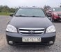 Daewoo Lacetti 2010 - Bán ô tô Daewoo Lacetti EX năm 2010, màu đen xe gia đình, 165 triệu