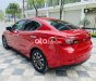 Mazda 2 2016 - Cần bán lại xe Mazda 2 AT sản xuất năm 2016, màu đỏ