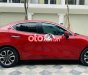 Mazda 2 2016 - Cần bán lại xe Mazda 2 AT sản xuất năm 2016, màu đỏ