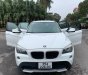 BMW X1 2010 - Bán BMW X1 năm 2010, màu trắng, xe nhập