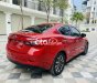 Mazda 2 2016 - Cần bán lại xe Mazda 2 AT sản xuất năm 2016, màu đỏ