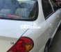 Kia Spectra 2004 - Bán xe Kia Spectra sản xuất 2004, màu trắng, nhập khẩu, giá 100tr