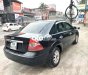 Ford Focus 2006 - Bán Ford Focus sản xuất 2006, màu đen xe gia đình, 180tr