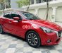 Mazda 2 2016 - Cần bán lại xe Mazda 2 AT sản xuất năm 2016, màu đỏ