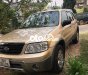 Ford Escape 2004 - Cần bán gấp Ford Escape năm 2004, màu vàng chính chủ