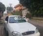 Daewoo Lanos 2003 - Cần bán lại xe Daewoo Lanos sản xuất năm 2003, màu trắng