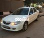 Mazda 323 2003 - Màu trắng chính chủ