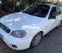 Daewoo Lanos 2003 - Cần bán Daewoo Lanos năm sản xuất 2003, màu trắng