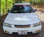 Mazda 323 1999 - Màu trắng, nhập khẩu