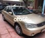 Ford Laser 2003 - Màu vàng số sàn