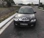 Mazda 323 2003 - Màu đen giá cạnh tranh