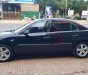 Ford Mondeo 2004 - Màu đen số tự động, 165tr